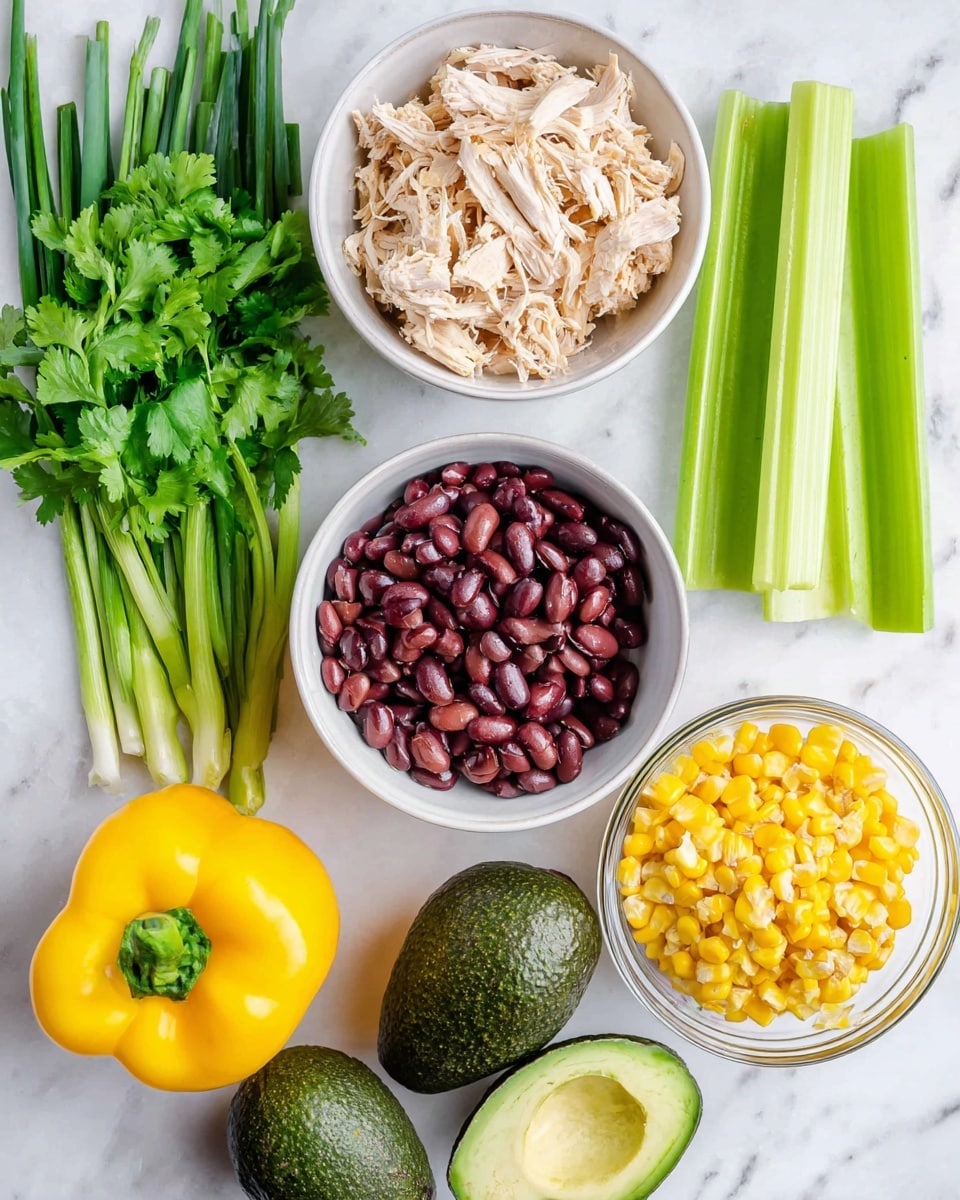 The image shows fresh ingredients neatly arranged on a white marbled surface. On the left side, a bunch of green onions and cilantro are placed vertically, adding a bright green touch. Next to them are three celery stalks with light green color. On the right side, three white bowls and one clear glass bowl are filled with different foods: the top left white bowl is filled with light brown shredded chicken, the bottom left white bowl holds dark red kidney beans, and the top right clear glass bowl contains bright yellow corn kernels. Below the bowls, a vibrant yellow bell pepper and a dark green avocado are placed side by side. The photo is taken with an iphone --ar 4:5 --v 7