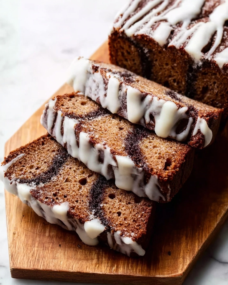 The image shows several slices of a brown cake with a moist texture, arranged in a slightly stacked way on a wooden board. Each slice has dark, thin layers inside, likely chocolate or cinnamon, and there is a white icing drizzled unevenly over the top and parts of the sides, creating a contrast with the cake's darker color. The cake looks soft and fluffy with small holes showing its light crumb. The background is a white marbled texture. photo taken with an iphone --ar 4:5 --v 7