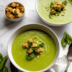 Roasted Courgette Soup with Peas and Basil topped with Ciabatta Croutons and Pine Nuts Recipe