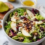 Pear Salad with Walnuts, Feta, Cranberries, and Maple Apple Cider Vinaigrette Recipe