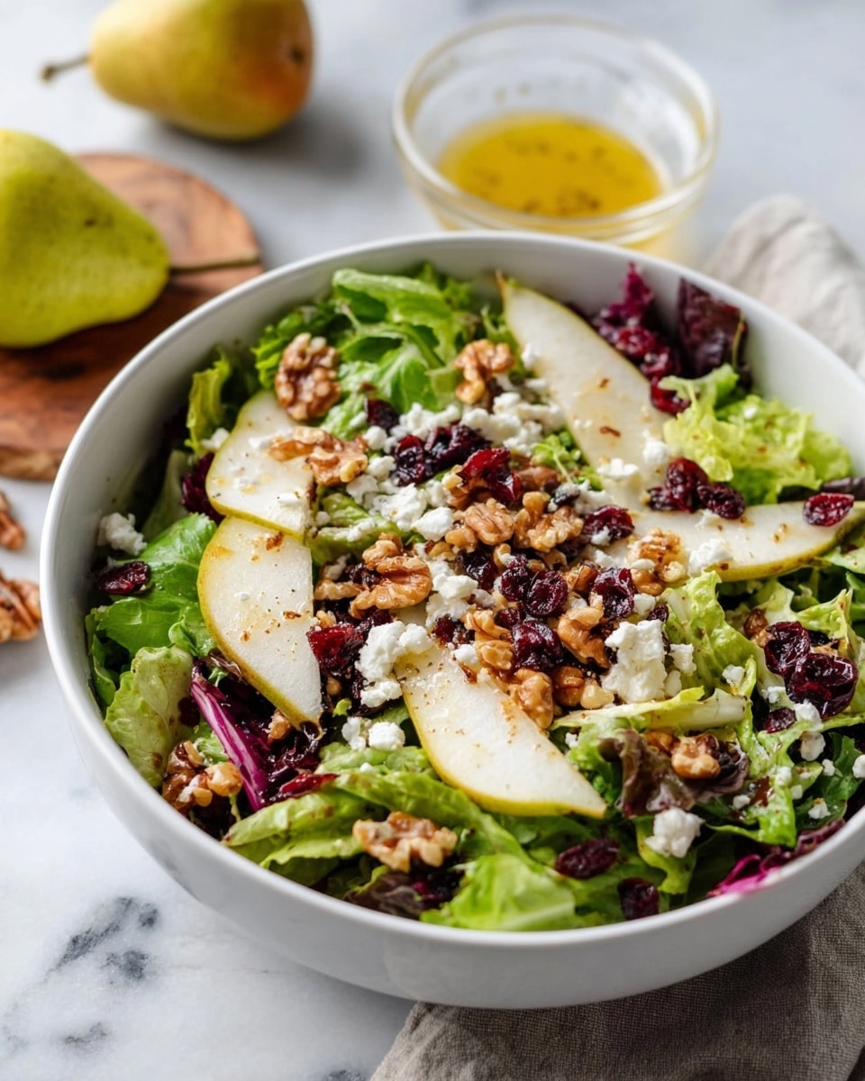 Pear Salad with Walnuts, Feta, Cranberries, and Maple Apple Cider Vinaigrette Recipe