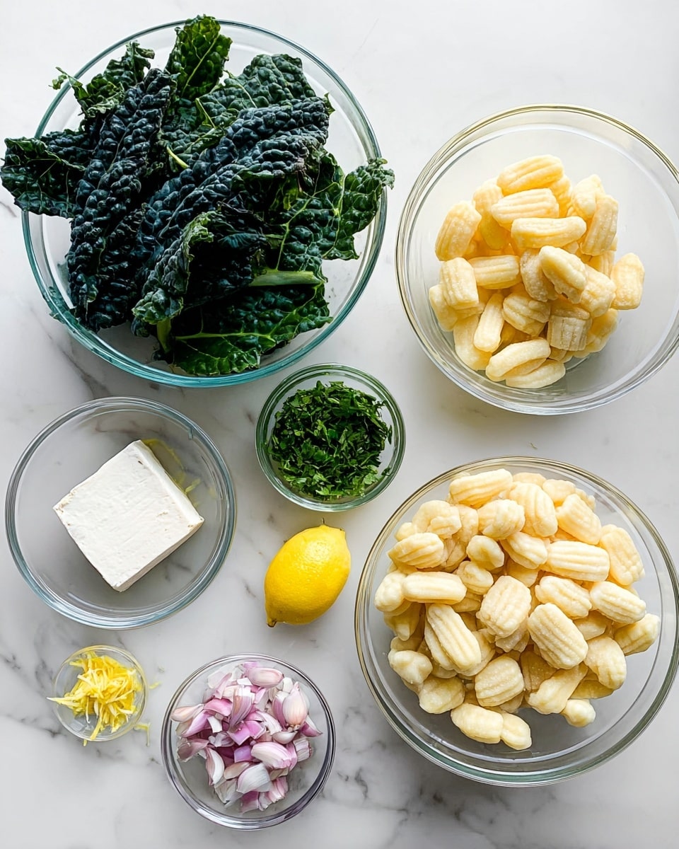 The image shows several glass bowls with different ingredients placed on a white marbled surface. One large bowl at the top contains dark green, curly kale leaves. Another large bowl at the bottom right is filled with small, pale yellow gnocchi pieces with ridged textures. In the center, a medium bowl holds a white block of soft cheese. To the right of the cheese, a small bowl contains chopped fresh green herbs. Below the cheese, a small bowl has finely chopped light purple shallots. To the left, there is a small bowl with finely chopped garlic, a small bowl with yellow lemon zest next to a peeled lemon half. All items are clear and bright, showing fresh ingredients. Photo taken with an iphone --ar 4:5 --v 7