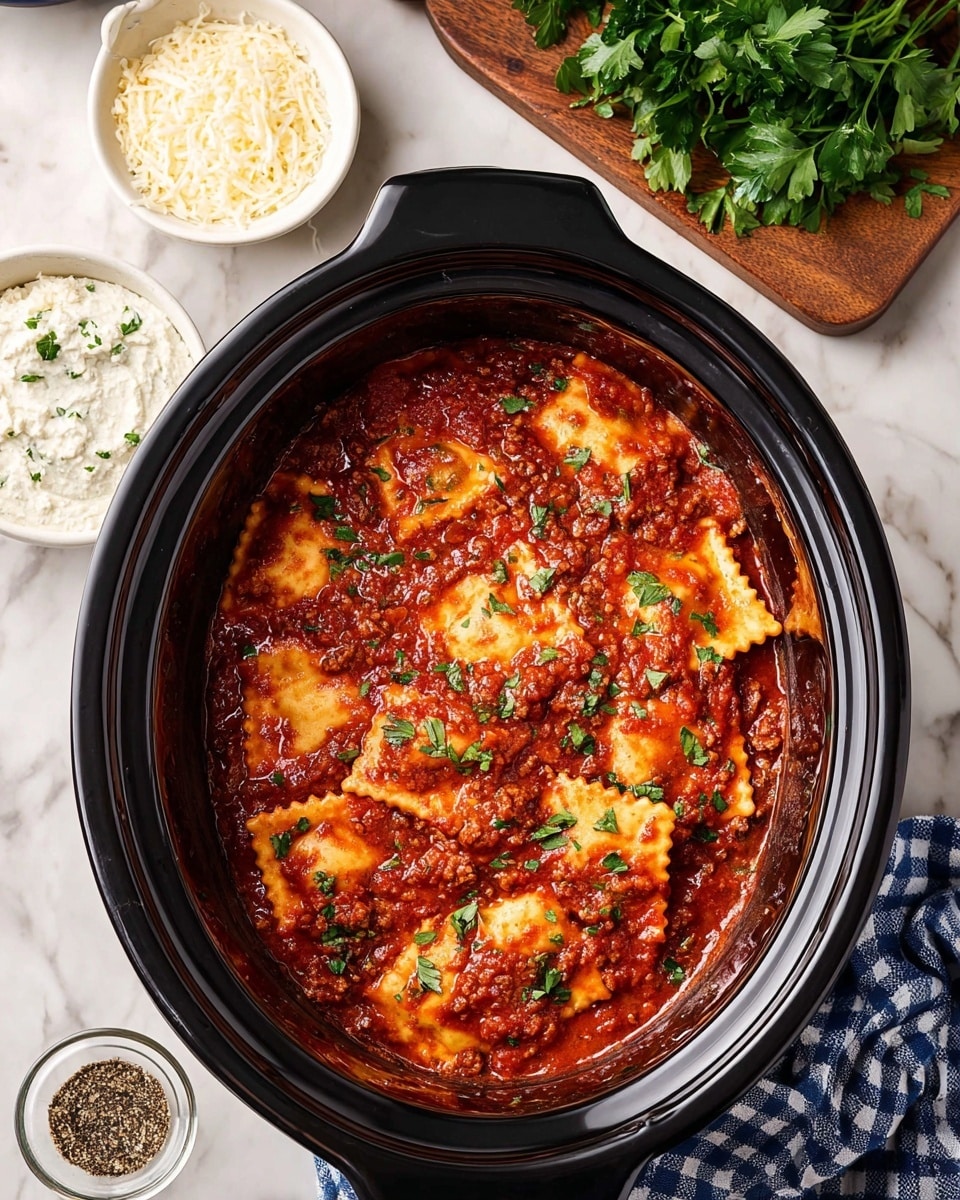 The image shows a black slow cooker filled with one large layer of square ravioli pasta pieces covered in thick red tomato sauce with visible bits of cooked ground meat; the sauce has a shiny texture and is sprinkled with small green parsley leaves scattered on top. The slow cooker sits on a white marbled surface, surrounded by three small white bowls,two with finely grated cheese and one with a creamy white sauce,along with a wooden board piled with green parsley and a small glass bowl containing ground black pepper. A blue and white checkered cloth is partly visible at the corner. Photo taken with an iphone --ar 4:5 --v 7