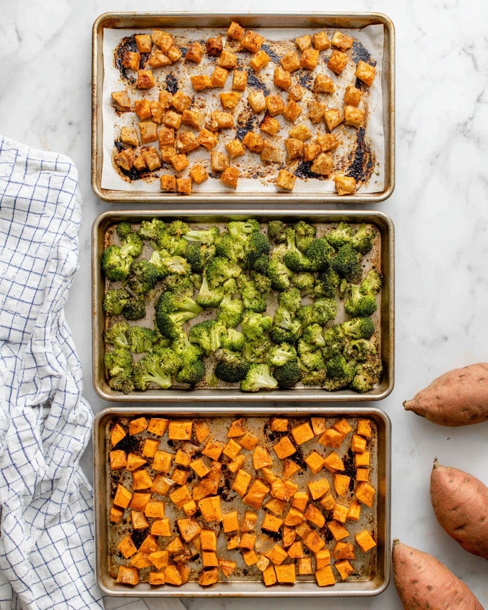 Three baking trays are placed vertically on a white marbled surface. The top tray contains small, browned, and slightly crispy orange-colored cubes spread unevenly on a parchment paper with dark brown roasted spots underneath. The middle tray has bright green broccoli florets scattered across the surface, some showing slight charring and textured with roasted bits. The bottom tray holds evenly spaced orange sweet potato cubes, lightly browned and roasted with rough edges. At the bottom right corner of the image, there are three whole sweet potatoes. A white cloth with a blue grid pattern is partially visible at the bottom left corner. photo taken with an iphone --ar 4:5 --v 7