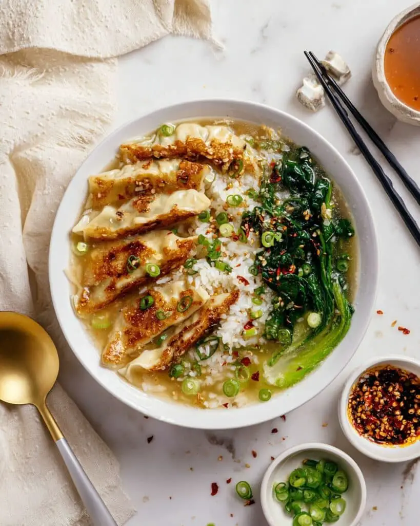 Brothy Rice with Ginger, Garlic, and Vegetable Dumplings Recipe