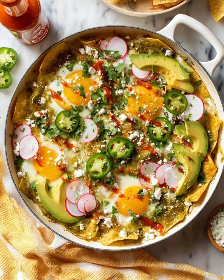 Chilaquiles with Fried Eggs, Avocado, and Cilantro Lime Crema Recipe