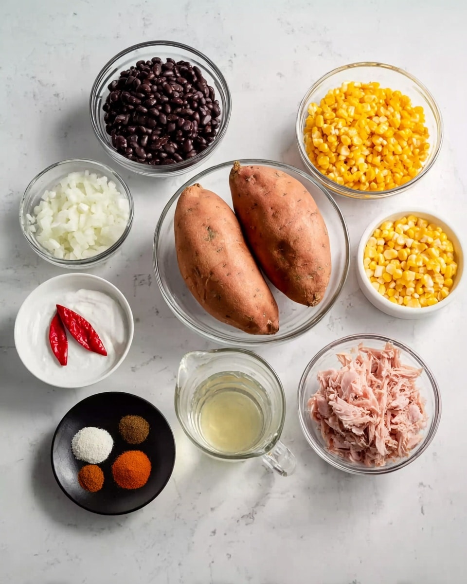 Several clear glass bowls and a white bowl are arranged on a white marbled surface, each containing different ingredients for cooking. In the center, a large clear glass bowl holds three whole sweet potatoes with orange skin. To the right is a white bowl filled with cooked black beans and above it a white bowl with shredded pink turkey. On the far right is a small white bowl with two sliced red chilies. Above the sweet potatoes is a clear glass bowl full of yellow corn kernels. To the left are three smaller clear glass bowls, one holding chopped white onions, one with a thick white cream, and one with a lime. In the front-center is a clear glass cup with a small amount of a light yellow liquid and next to it a clear glass pitcher filled with water. A black plate with various spices - brown, red, and beige powders - sits near the onions, completing the layout. The photo taken with an iphone --ar 4:5 --v 7