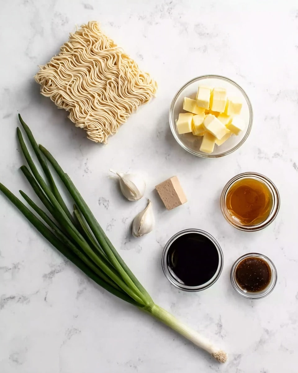 The image shows raw ramen noodle blocks on the top left, light beige and wavy in texture. Below them is a small clear bowl filled with yellow butter cubes. Near the center are a few cloves of garlic, white with light purple streaks, and a small square of light brown solid piece. To the right, there are three small clear bowls with dark sauces two almost black and one brownish gold, arranged in a rough triangle. At the bottom stretches a long green onion, with a dark green top and white bulb on the right end. The whole set is placed on a white marbled surface. photo taken with an iphone --ar 4:5 --v 7