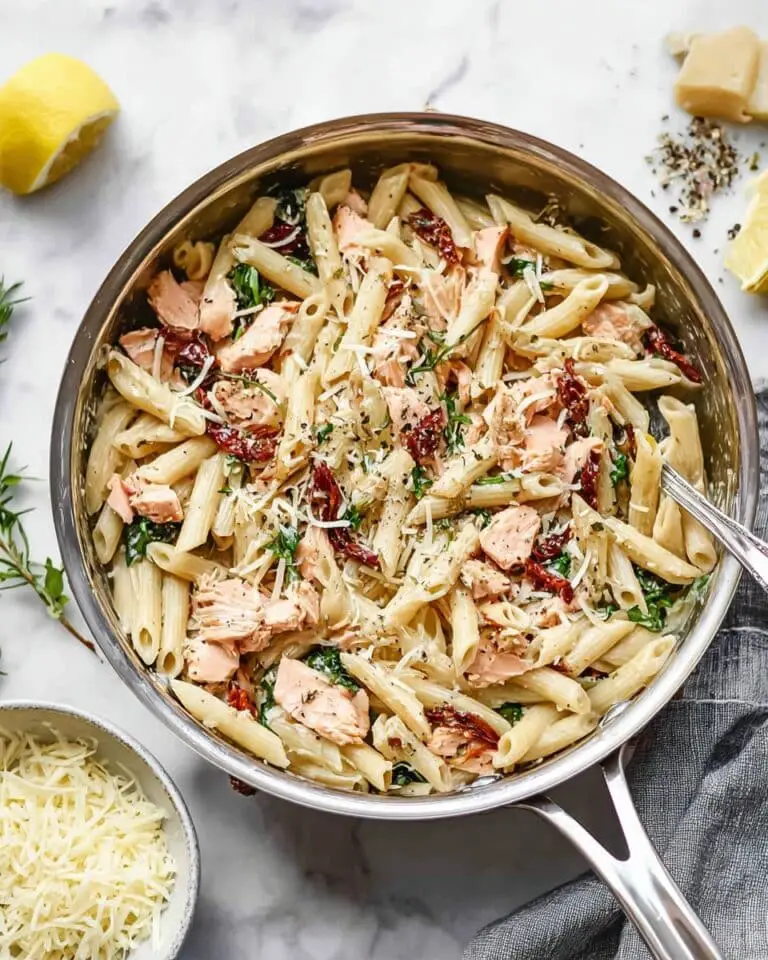 Lemon Herb Salmon Pasta with Sun-Dried Tomatoes and Basil Recipe
