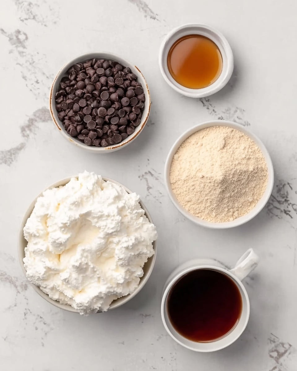 The image shows five dishes arranged on a white marbled surface. On the top left, there is a small bowl filled with dark brown chocolate chips, looking smooth and shiny. To the top right of it, a small white bowl contains a dark golden syrup with a glossy texture. Below these two, a medium white bowl holds a light beige powder that looks soft and fine. On the bottom right, a white cup with a handle is filled with a dark caramel-colored liquid, shiny and smooth on the surface. On the bottom left, a larger white bowl is filled with fluffy, white whipped cream, soft and airy in texture. The items are spaced neatly and the lighting is bright and even, highlighting the textures. photo taken with an iphone --ar 4:5 --v 7