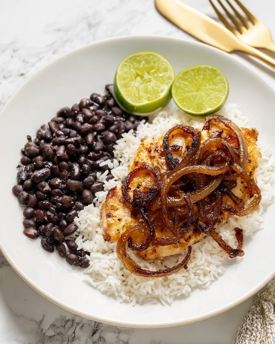 A white plate with three main layers: on the left side, a pile of black beans with a shiny, smooth texture; next to it, white rice with soft, separate grains forming the base layer; on the right, a piece of cooked, golden brown chicken topped with caramelized, translucent onion rings that have dark browned edges, giving a textured look; behind the chicken, two bright green lime wedges sit neatly on the plate. The plate is placed on a white marbled surface with gold cutlery to the side. photo taken with an iphone --ar 4:5 --v 7