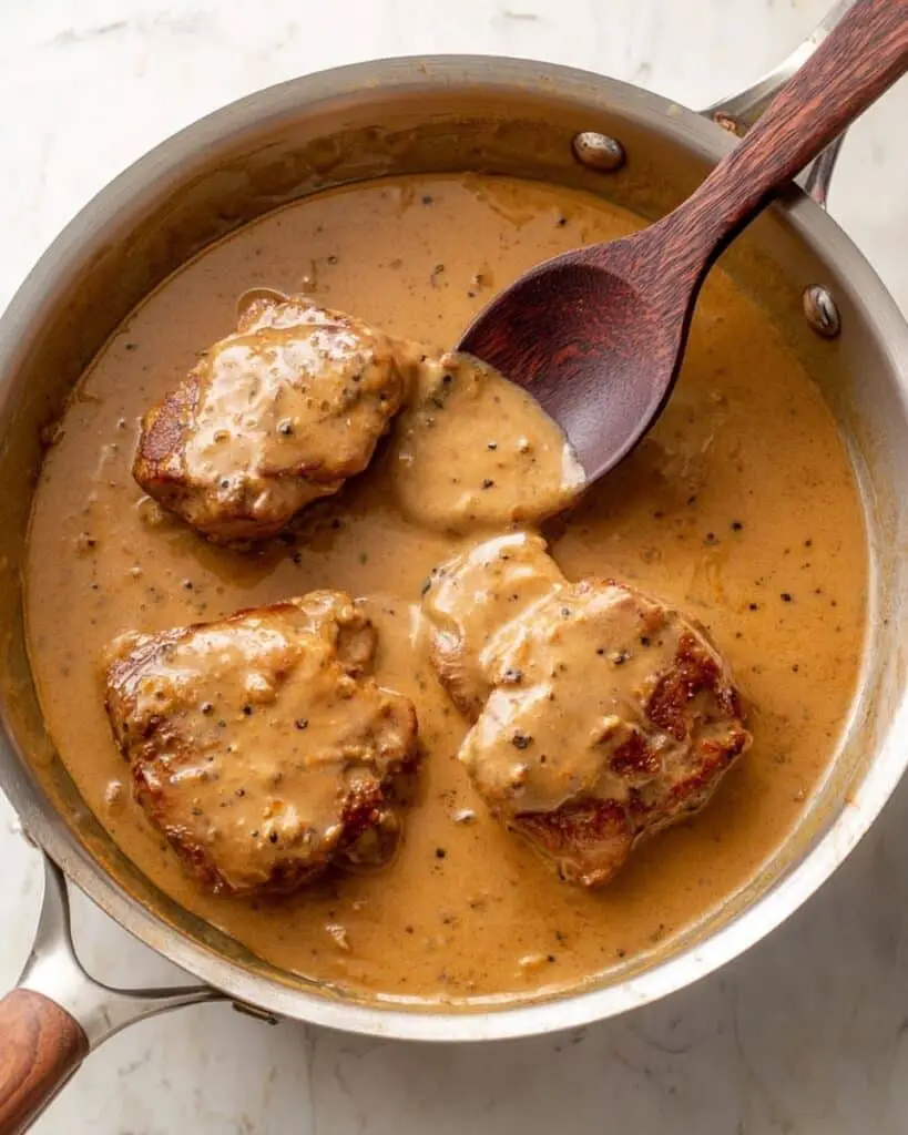 Southern Smothered Chicken Thighs with Gravy and Rice Recipe