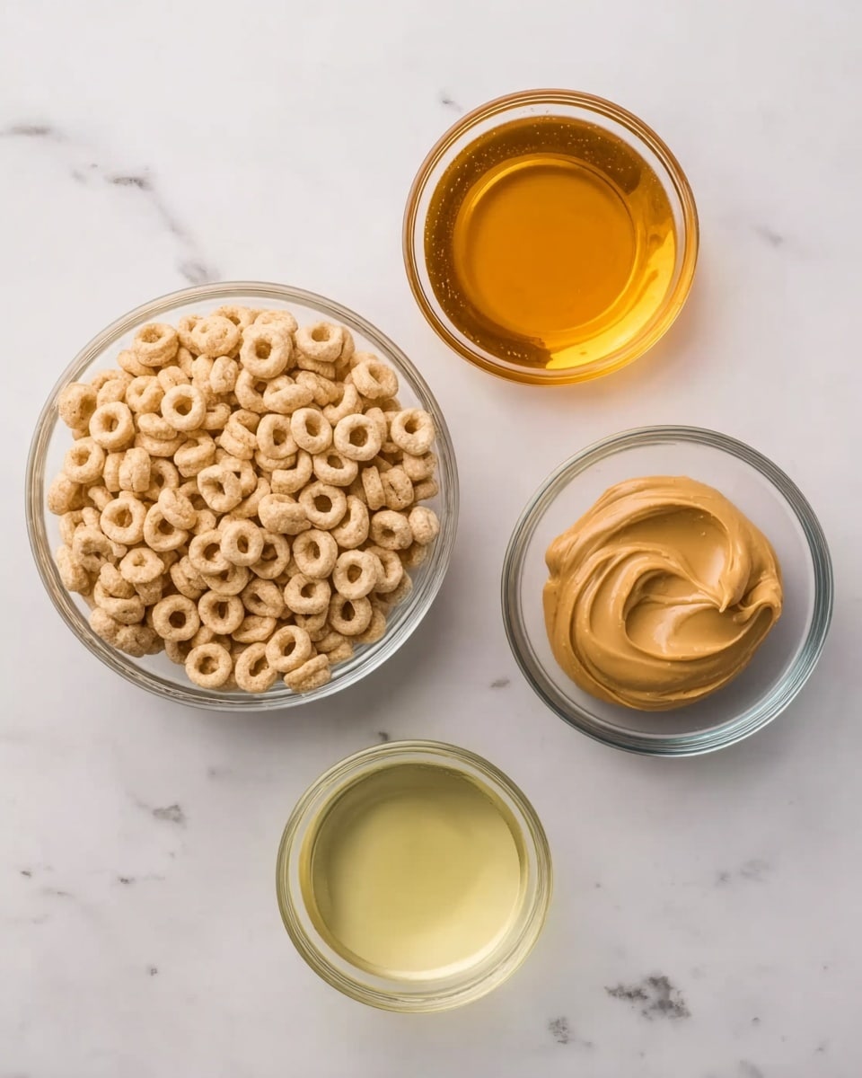 A white marbled surface holds four glass bowls arranged loosely in a square shape. The largest bowl on the left is filled with a light tan circular cereal, showing a smooth, slightly rounded texture. The top right bowl contains a golden amber liquid with a shiny surface. Below it, the bottom right bowl holds a creamy peanut butter with a smooth, slightly whipped texture and light brown color. The smallest bowl at the bottom center contains a small amount of light yellow liquid, smooth and clear. photo taken with an iphone --ar 4:5 --v 7