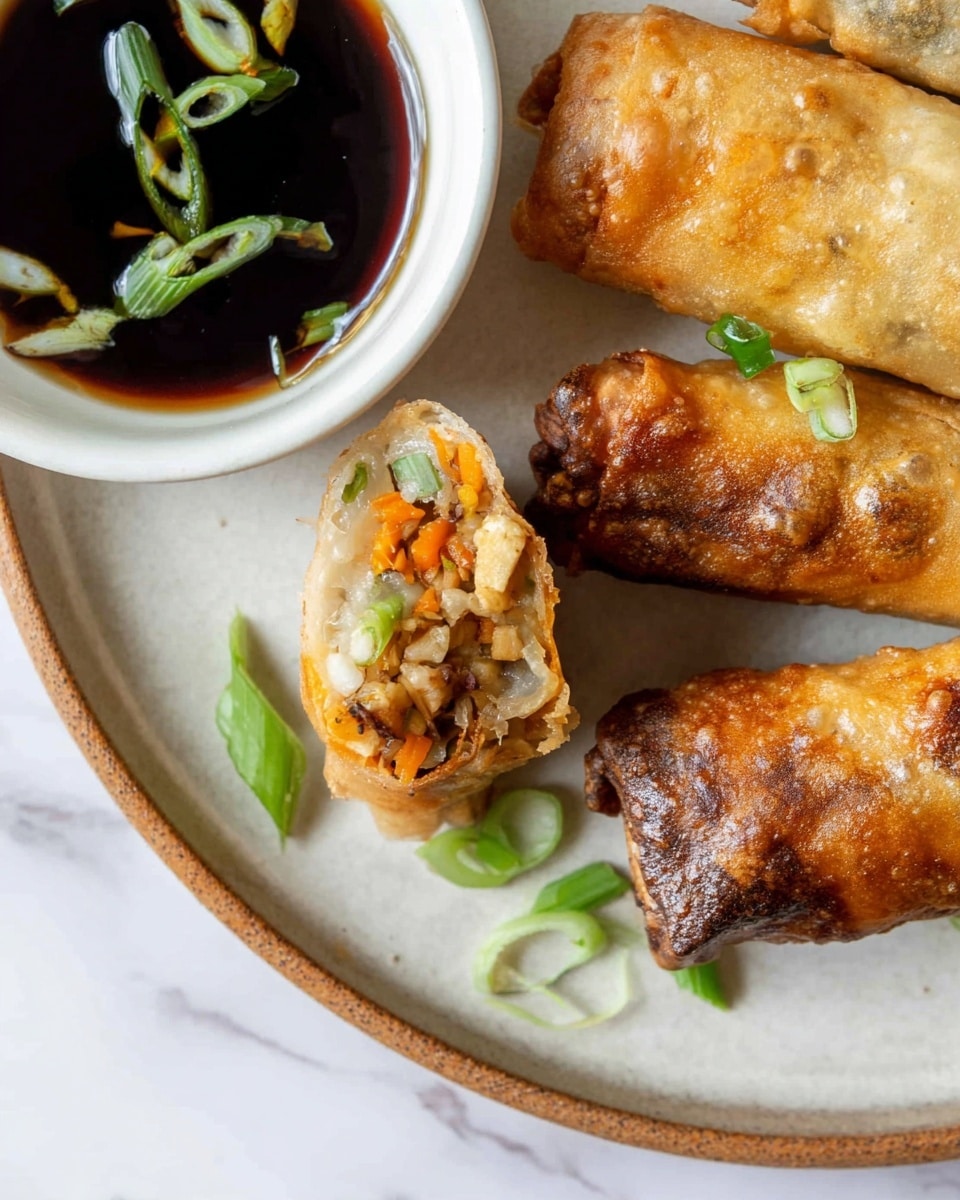A close-up view of three crispy spring rolls on a light beige plate with a brown rim, placed on a white marbled surface. The spring rolls have a golden-brown and slightly charred outer layer, showing bubbles and a crunchy texture. One spring roll is cut open, revealing a filling with three visible layers: orange shredded carrots on the top, small green pieces in the middle, and a light beige chunk, possibly tofu, at the bottom. Green onion slices are sprinkled over the spring rolls and plate. Next to the plate, there is a white bowl filled with dark brown soy sauce and floating green onion slices. Photo taken with an iphone --ar 4:5 --v 7