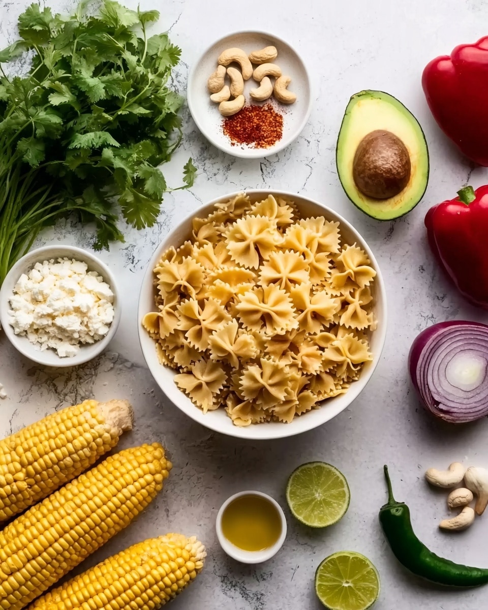 The image shows a white bowl full of dry farfalle pasta placed at the center on a white marbled surface. Around the bowl, there are two ears of yellow corn at the bottom left, a whole halved avocado with bright green inside and the seed visible above the bowl, a bunch of fresh green cilantro on the top left, a red bell pepper on the top right, and a small purple onion at the bottom center. Nearby, there are two small white bowls, one with white cheese and the other with cashew nuts, along with a small bowl of red spices and a small bowl with a golden oil-like liquid. Two halves of lime and a green chili pepper are also near the bottom of the bowl. Photo taken with an iphone --ar 4:5 --v 7